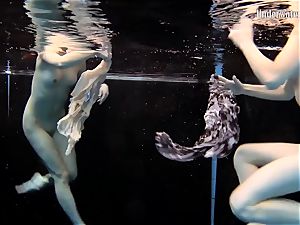 two dolls swim and get bare luxurious